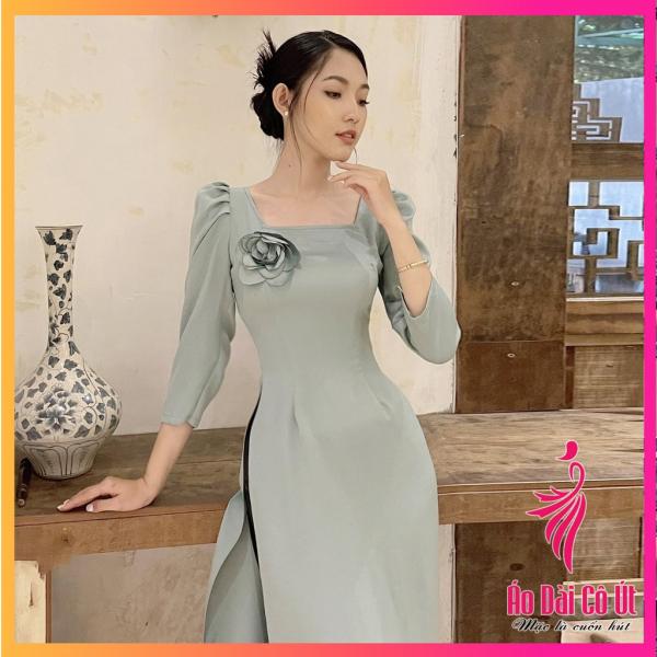 &Aacute;o d&agrave;i lụa t&acirc;y thi cổ vu&ocirc;ng tay bồng m&agrave;u xanh ngọc đ&iacute;nh hoa d&ugrave;ng cho dự tiệc cưới hỏi lễ tết đẹp